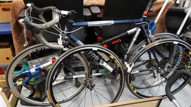 1 road bike with 2 spare wheels