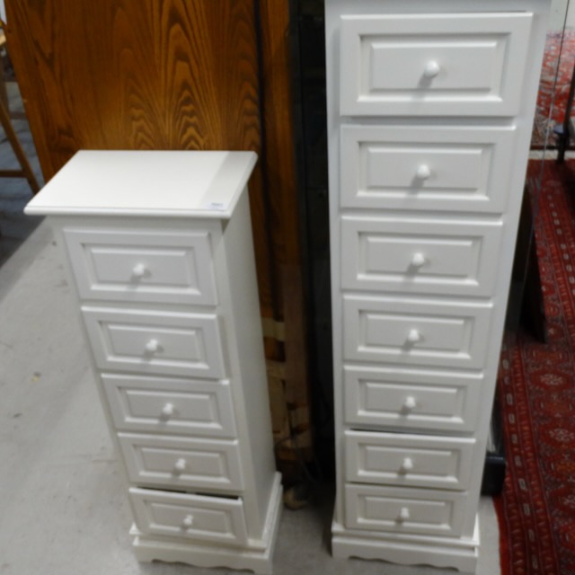 2 white cabinets